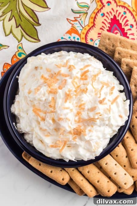 Coconut Pineapple Cloud Dip 6 Fruit Dip with coconut, pineapple, cream cheese, and rum extract.