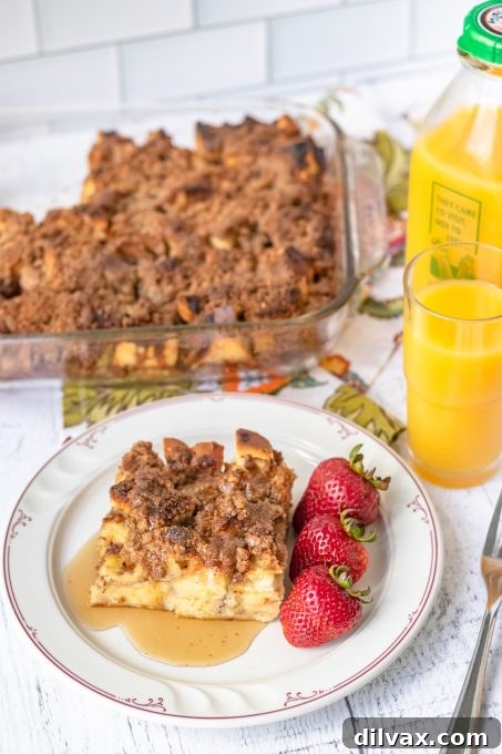 Cinnamon French Toast Casserole 7 Close-up of Baked Cinnamon French Toast with maple syrup.
