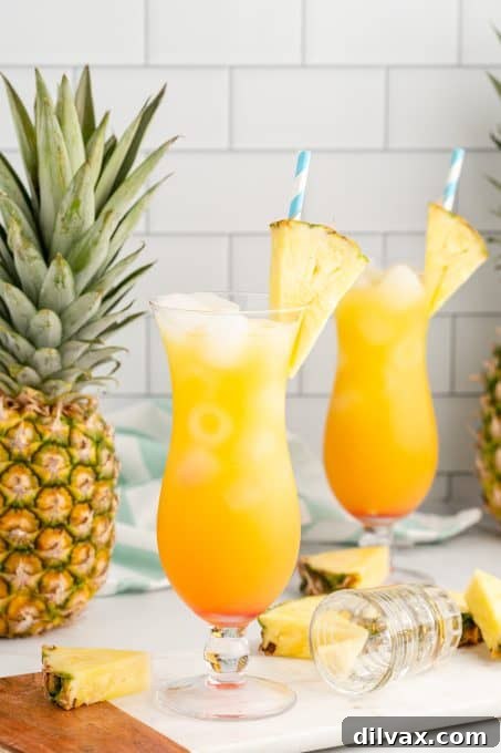 Tropical Empress 10 Grenadine, pineapple and orange juice and rums make this amazing Caribbean cocktail.