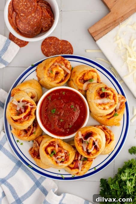 Cheesy Pepperoni Pizza Spirals 10 Small pepperoni pizza pinwheels, perfect as appetizers or a main dish.