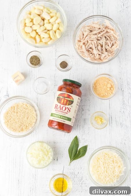 Ingredients for Chicken Parmesan Gnocchi laid out on a kitchen counter