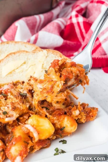 Key ingredients for an easy chicken dinner: gnocchi, rotisserie chicken, and pasta sauce