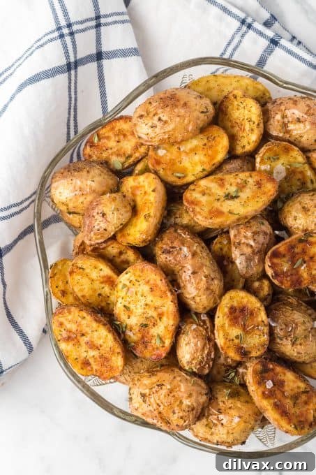 Perfectly Crispy Air Fryer Potato Bites 7 Crispy golden air fryer potatoes in a basket, freshly cooked