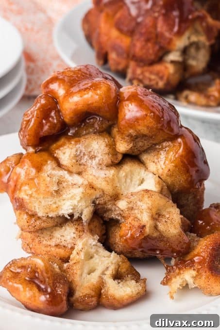 Moms Homemade Monkey Bread 3 Close-up of golden Monkey Bread with a caramel-like glaze.