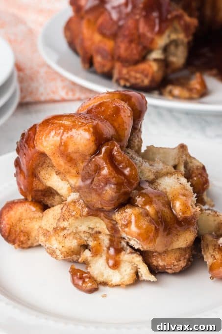 Moms Homemade Monkey Bread 9 Unbaked pieces of bread dough coated in cinnamon sugar.