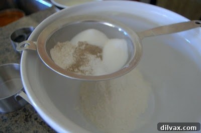 Delightful Eggless Vanilla Cardamom Cake 4 Dry ingredients sifted and whisked together in a bowl