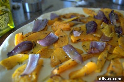 Mediterranean Roasted Vegetable Spinach and Feta Pizza 11 Pizza crust topped with roasted butternut squash and red onion