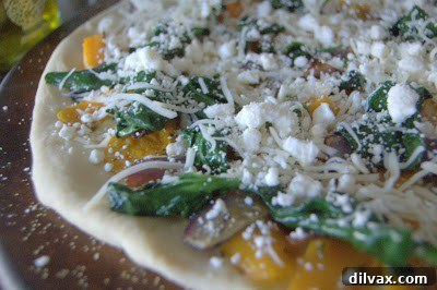 Mediterranean Roasted Vegetable Spinach and Feta Pizza 13 Pizza generously topped with shredded mozzarella and crumbled feta cheese