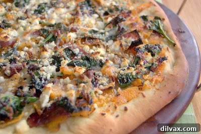 Mediterranean Roasted Vegetable Spinach and Feta Pizza 15 Close-up of a slice of Roasted Vegetable, Spinach & Feta Pizza, showcasing the delicious toppings