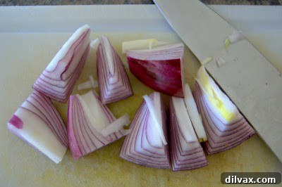 Mediterranean Roasted Vegetable Spinach and Feta Pizza 3 Butternut squash and red onion prepped for roasting with herbs and garlic