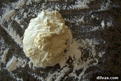 Mediterranean Roasted Vegetable Spinach and Feta Pizza 9 Pizza dough rolled out and ready for toppings