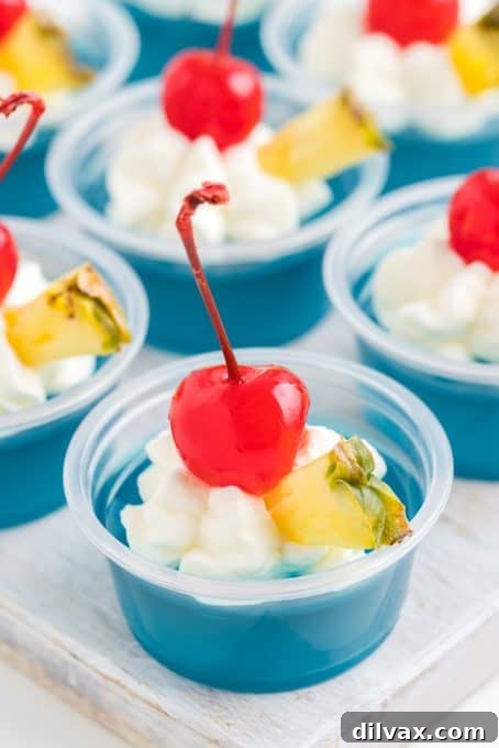 Easy Blue Hawaiian Jello Shots: Bring the Tropics Home 9 A tray filled with elegant Blue Hawaiian Jello Shots, showcasing their professional presentation.