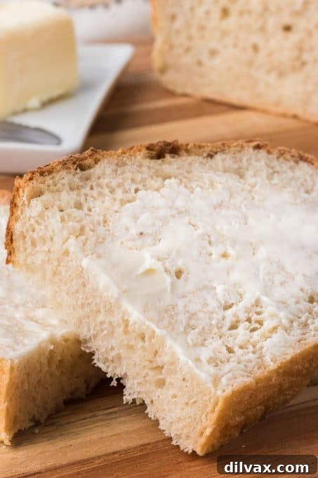 Artisan Italian Loaves 3 Homemade Easy Italian Bread - A golden-crusted loaf on a cooling rack.