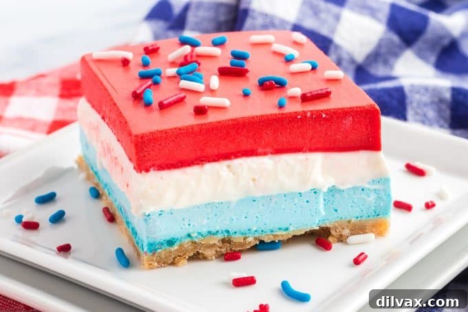 Patriotic Dream Bars 2 Red, White, and Blue Dream Bars sliced and ready to serve