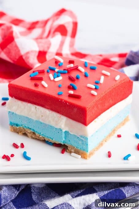 Patriotic Dream Bars 3 Close-up of a stack of Red, White, and Blue Dream Bars