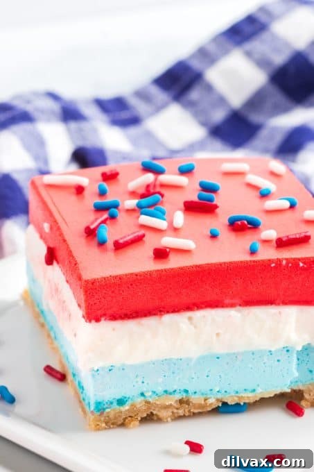 Patriotic Dream Bars 9 Patriotic no bake Dream Bars with whipped cream and sprinkles