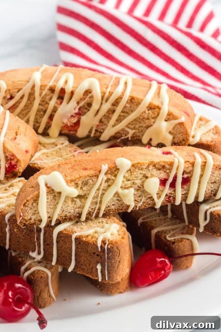 Amarena Cherry Biscotti 8 Biscotti drizzled with white chocolate and made with cherries.