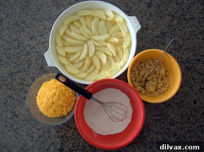 Mixing sugar, flour, and juice for the apple casserole