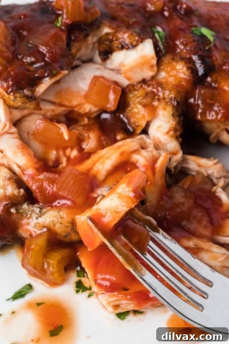 A tender bite of chicken with delicious homemade vinegar BBQ sauce