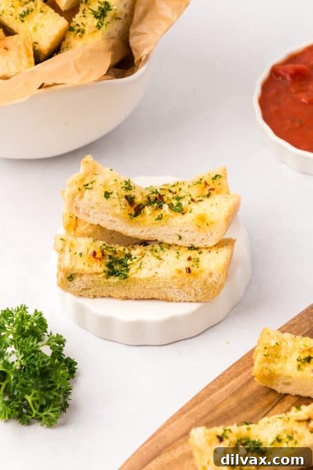 Effortless Air Fryer Garlic Bread Pronto 10 Bread slices with a garlic butter.