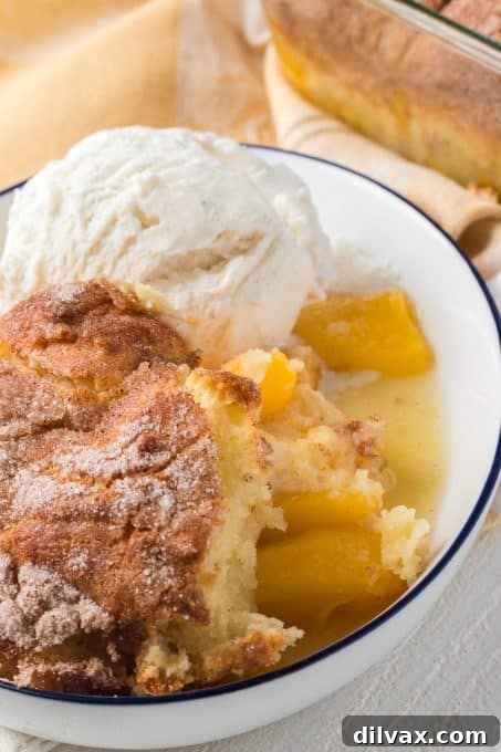 Effortless Golden Peach Cobbler 11 Fresh peach cobbler served warm with a scoop of vanilla ice cream