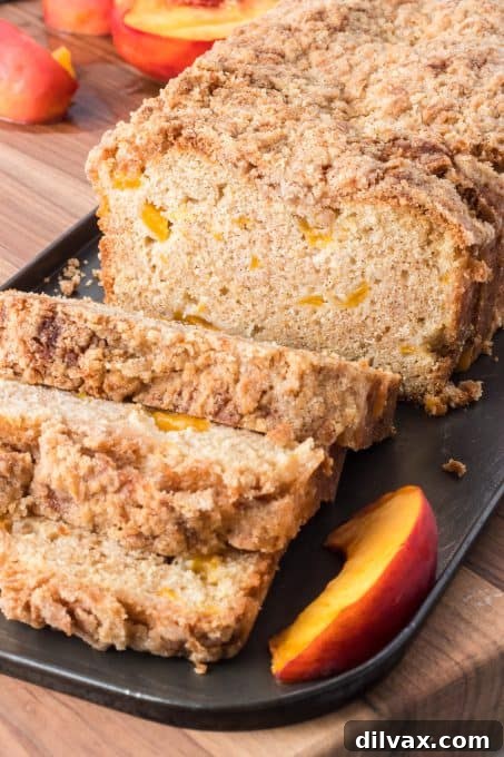 Sun-Kissed Peach Loaf 12 A slice of homemade Peach Bread, perfect for any occasion.