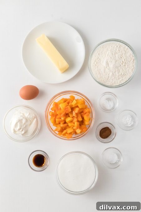 Sun-Kissed Peach Loaf 5 Essential ingredients laid out for making the perfect Peach Bread.