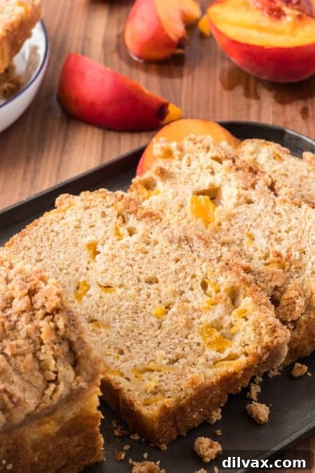 Sun-Kissed Peach Loaf 7 A freshly baked Peach Quick Bread, golden brown and inviting.