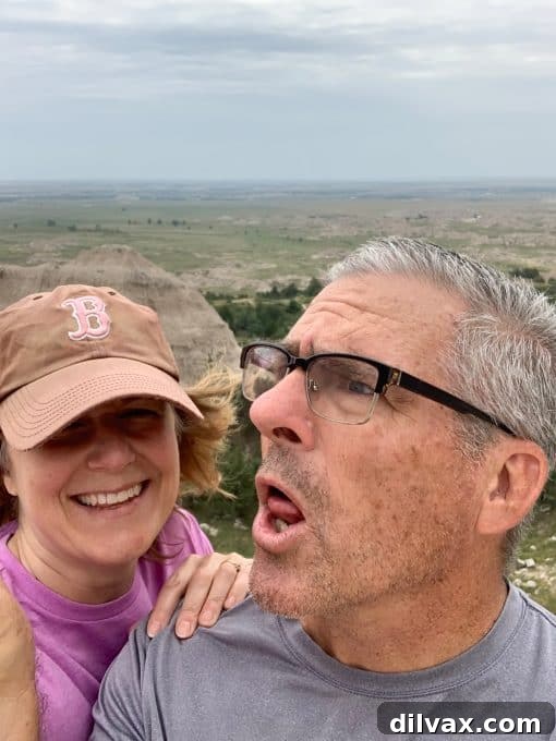 Kurt and Lynne Feifer smiling together, embodying a warm and welcoming spirit