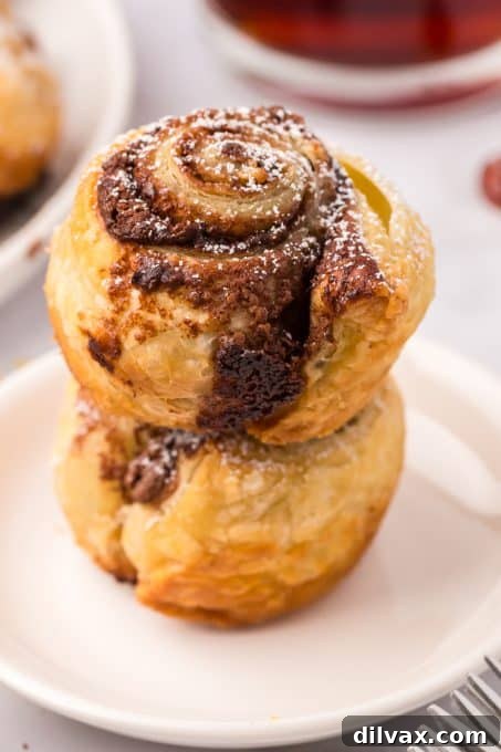Decadent Nutella Cruffins 3 Closeup of a Nutella Cruffin showing its flaky layers