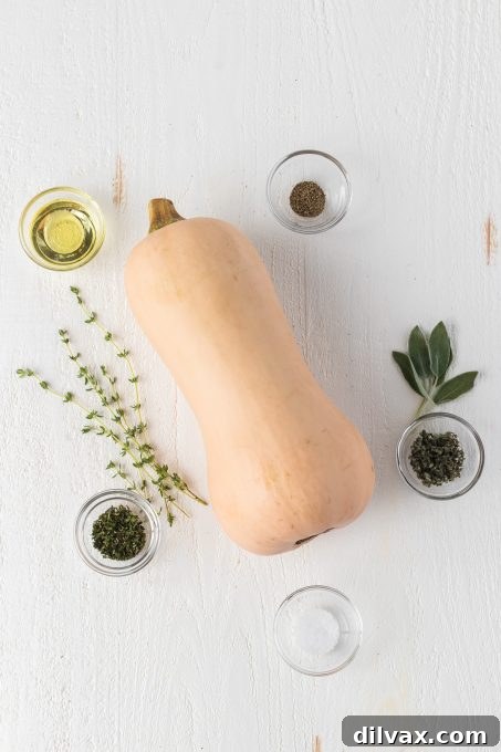 Golden Roasted Butternut Squash 4 Ingredients for Roasted Butternut Squash laid out on a cutting board