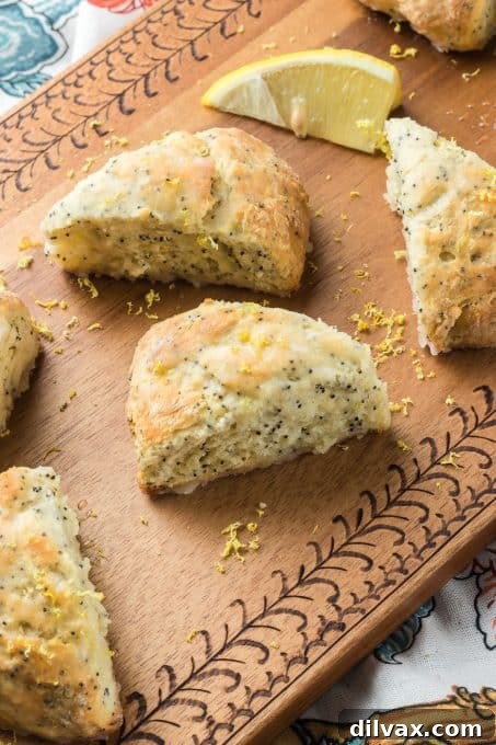Lemon Scones with poppy seeds and a glaze.