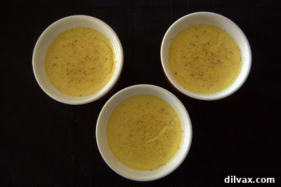 Baked Eggnog Crème Brûlée in ramekins in a water bath