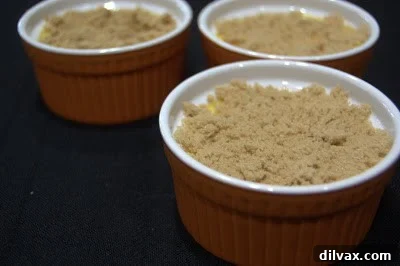 Close-up of a perfectly caramelized sugar top on Eggnog Creme Brulee.