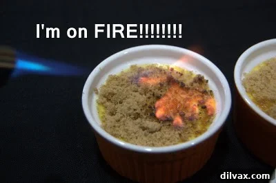 An example of slightly burnt caramelized sugar on creme brulee, showing dark patches.