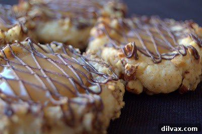 Unwrapping the Flavor: My 12 Days of Cookie Review 12 Delicious Salted Caramel Thumbprint Cookies with glistening caramel centers