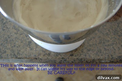 Mixer bowl after beating sugars, showing a well-combined mixture.