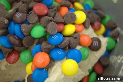 Cookie dough with M&Ms and chocolate chips folded in.