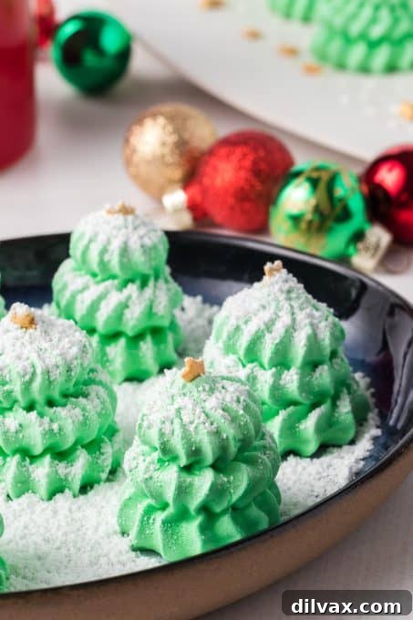 Powdered sugar to look like snow on meringue tree cookies.