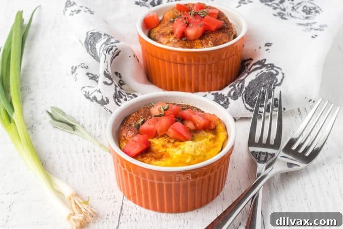 Delicious Sage and Ham Baked Eggs served in ramekins with fresh sage.