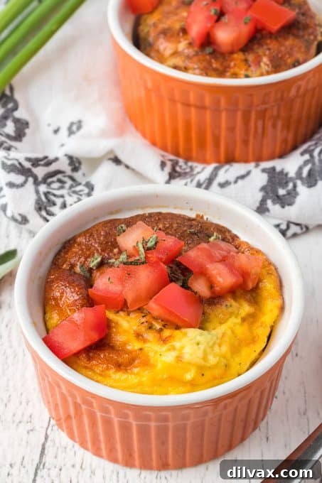 Close-up of Sage and Ham Baked Eggs in a white ramekin.