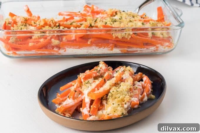 Horseradish Carrots, a vibrant side dish perfect for any meal, topped with crispy breadcrumbs.