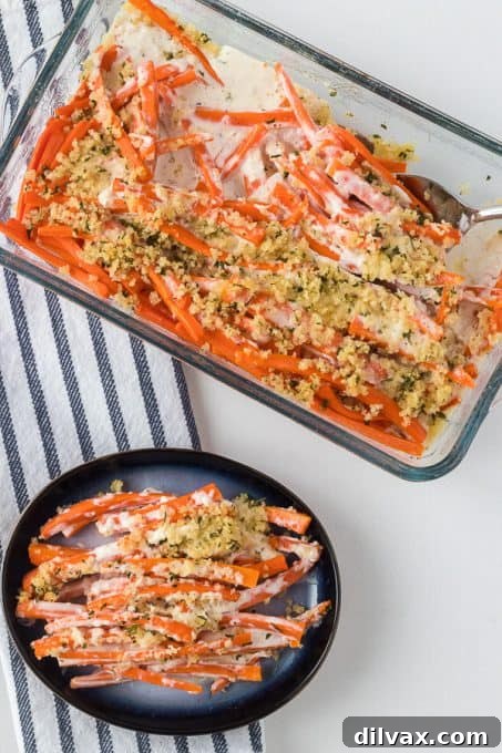 A vibrant serving of flavorful carrot side dish, freshly made and ready to be savored.