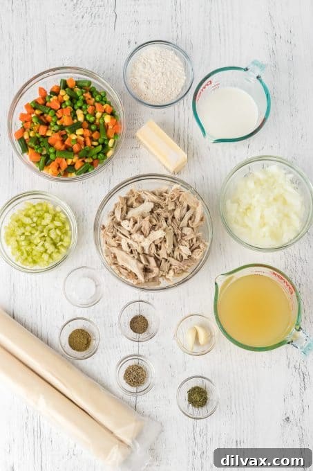 Comforting Turkey Pot Pie 4 Ingredients for Turkey Pot Pie laid out on a table.