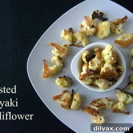 Roasted Teriyaki Cauliflower - A bowl of freshly roasted cauliflower florets glistening with teriyaki sauce.