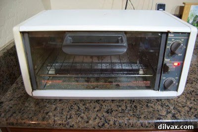 A versatile toaster oven on a kitchen counter.