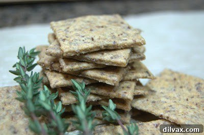 Freshly baked homemade wheat crackers on a cooling rack, ready to be enjoyed.