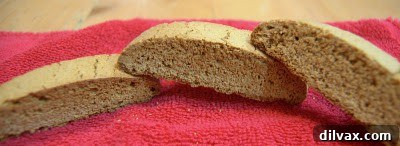 Gingerbread biscotti on a cooling rack, freshly baked.