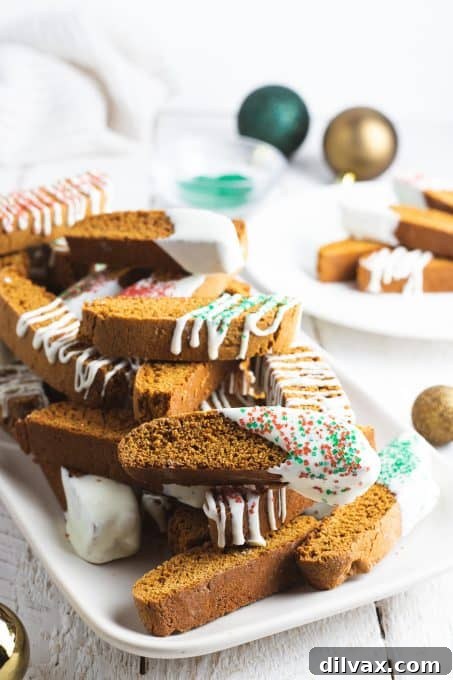Spiced Gingerbread Biscotti 3 Perfectly baked gingerbread biscotti arranged on a cooling rack