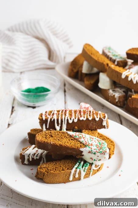 A selection of gingerbread cookies, some decorated.
